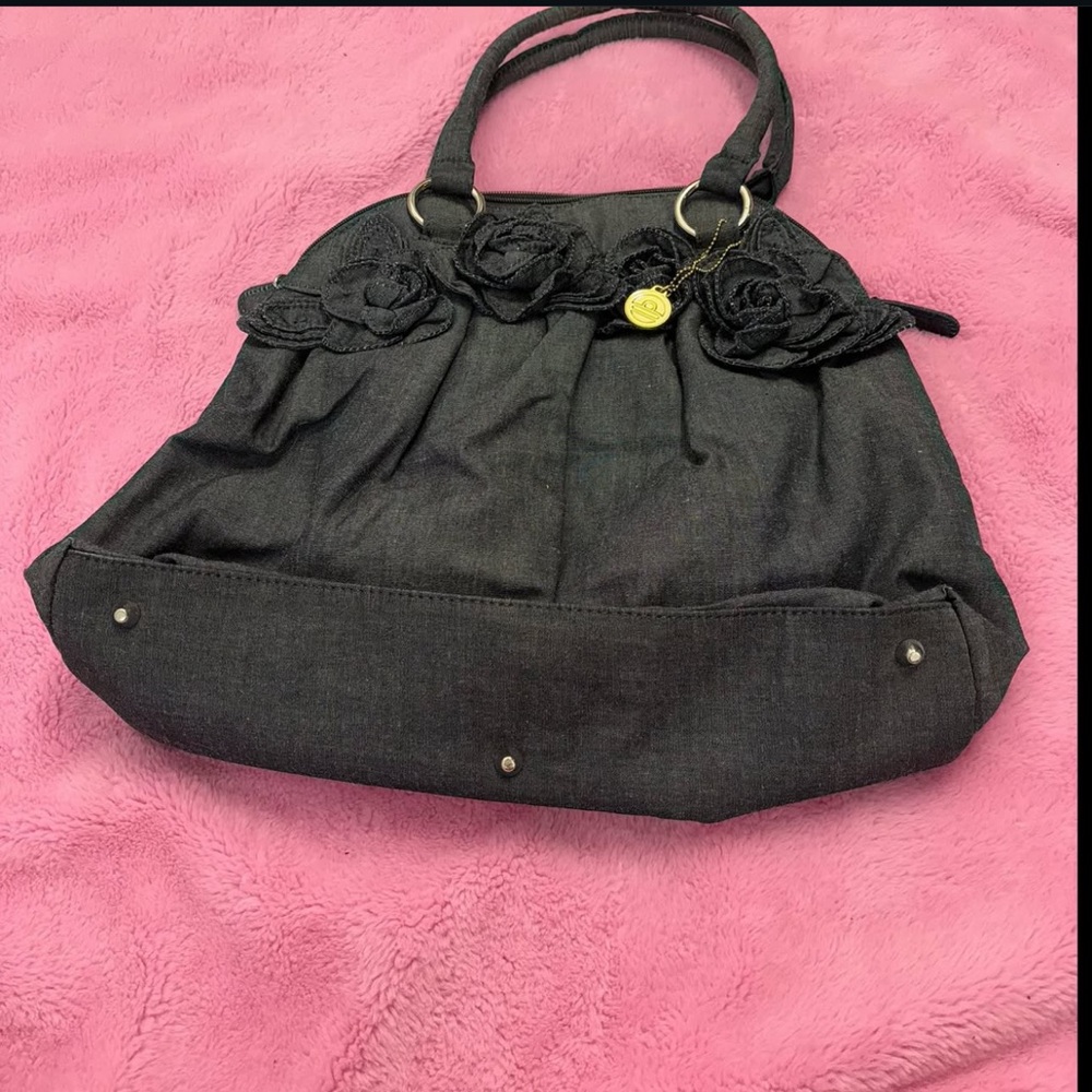 Elegant Black Handbag with Floral Accents